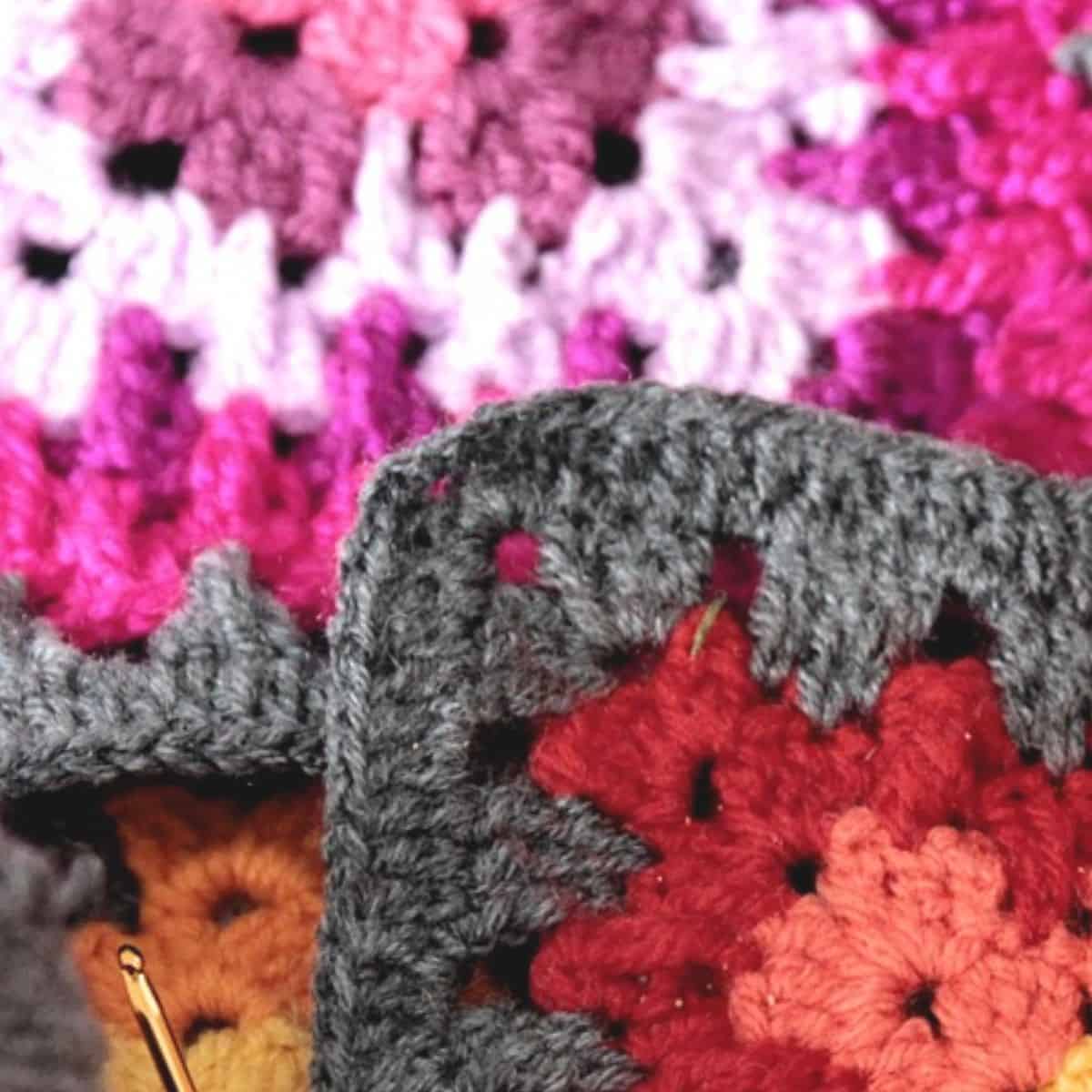 yarn grannie square crochetted blanket closeup
