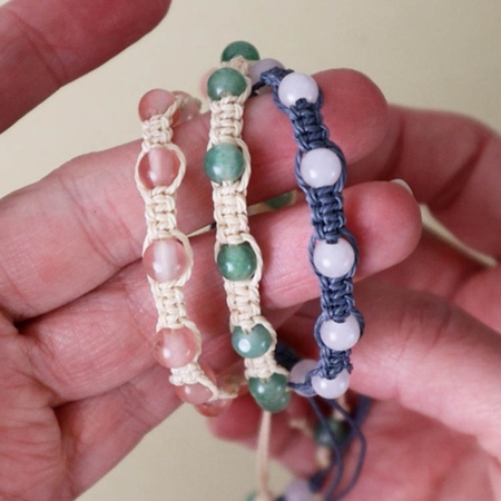 Beaded macrame bracelet tutorial with sliding knots and pastel beads in three finished bracelet samples.